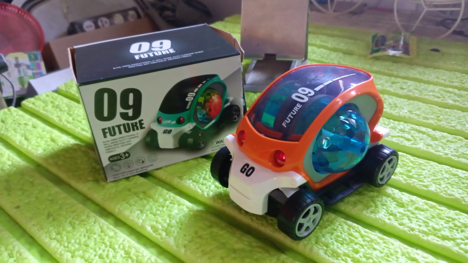 17922 Plastic 360 Degree Rotating Stunt Car Toy for Kids - Bump and Go Action with 4D Lights and Music, Plastic Mini Car with Disco Ball (1 Pc / Battery Not Included) 17922 Plastic 360 Degree Rotating Stunt Car Toy for Kids - Bump and Go Action with 4D Lights and Music, Plastic Mini Car with Disco Ball (1 Pc / Battery Not Included)